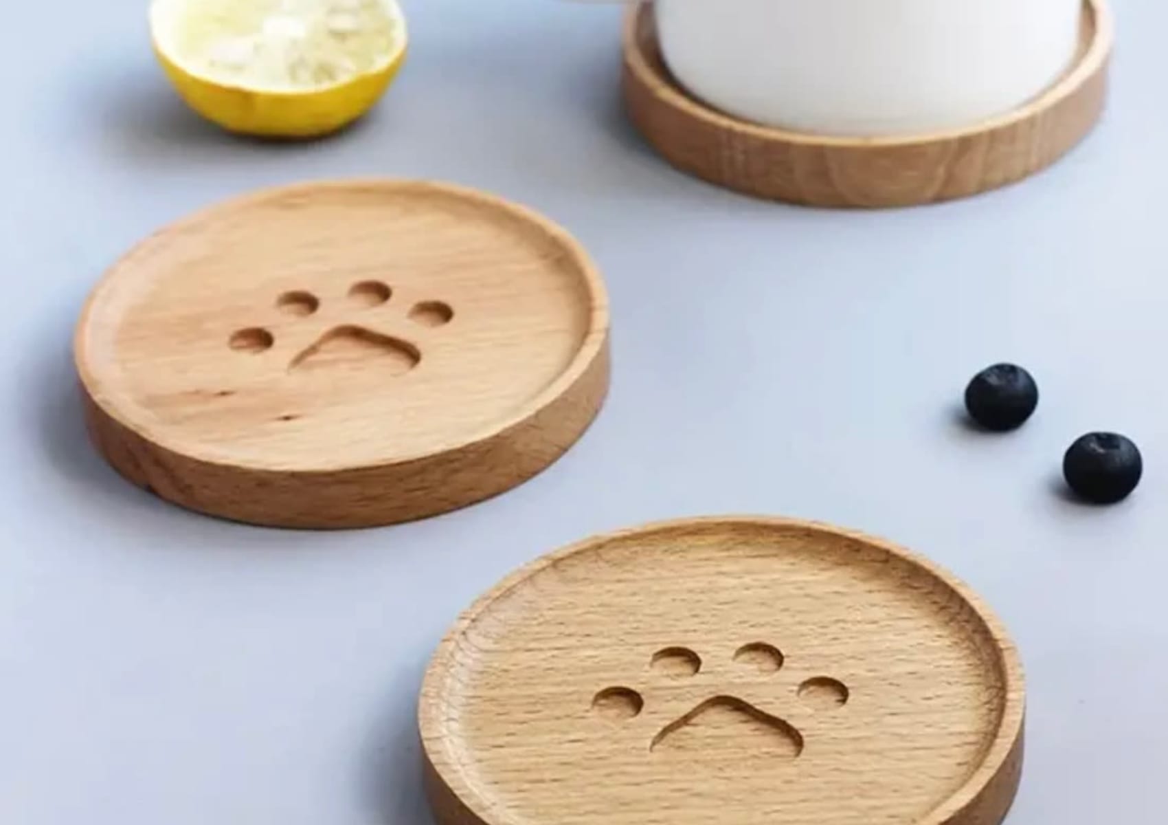 Wooden drinks coaster with engraved pawprint