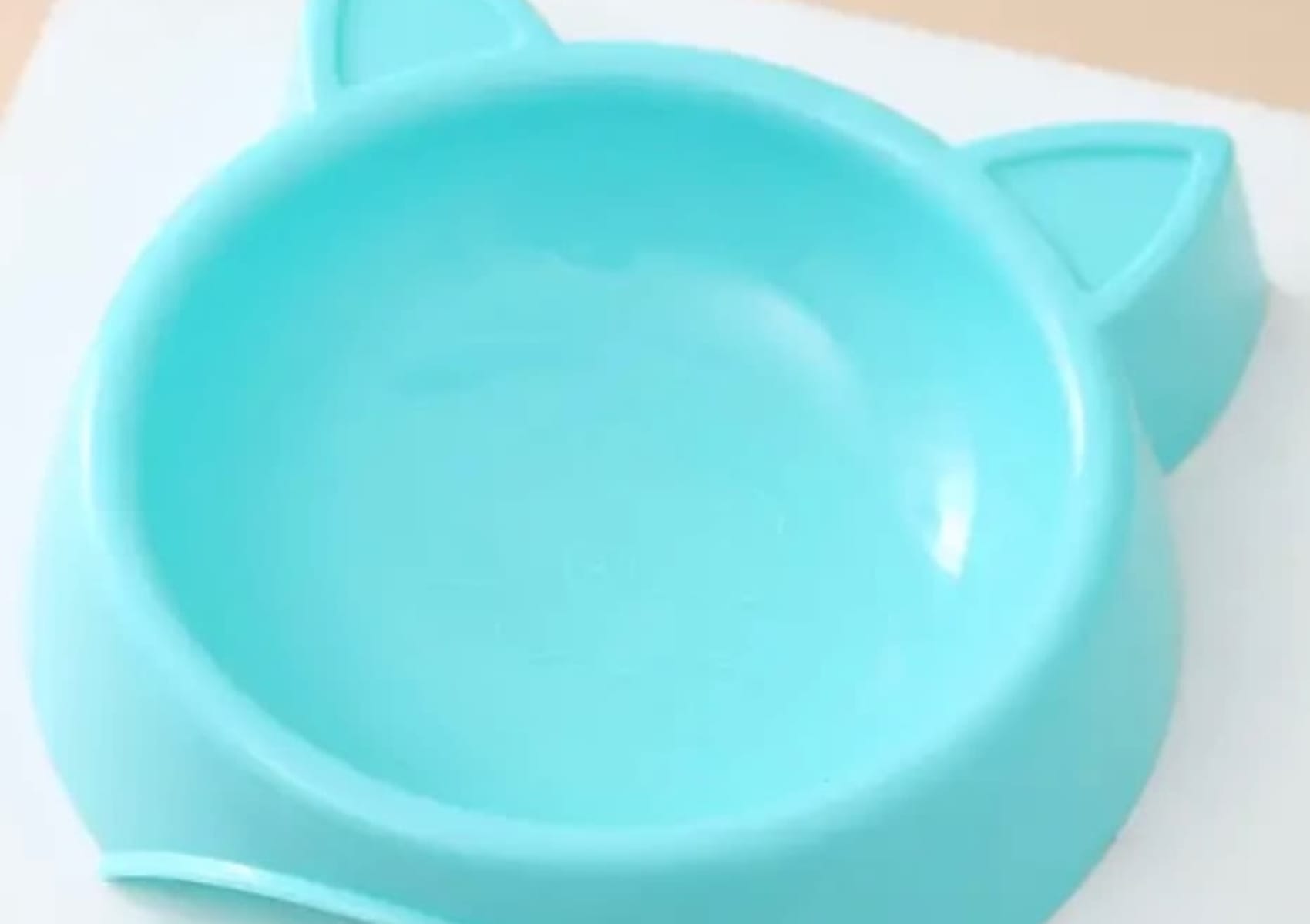 Blue cat shaped food or water bowl with cat face