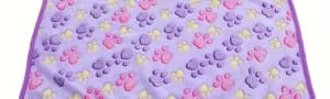 Soft snuggly purple paw print pattern blanket for your cat or dog