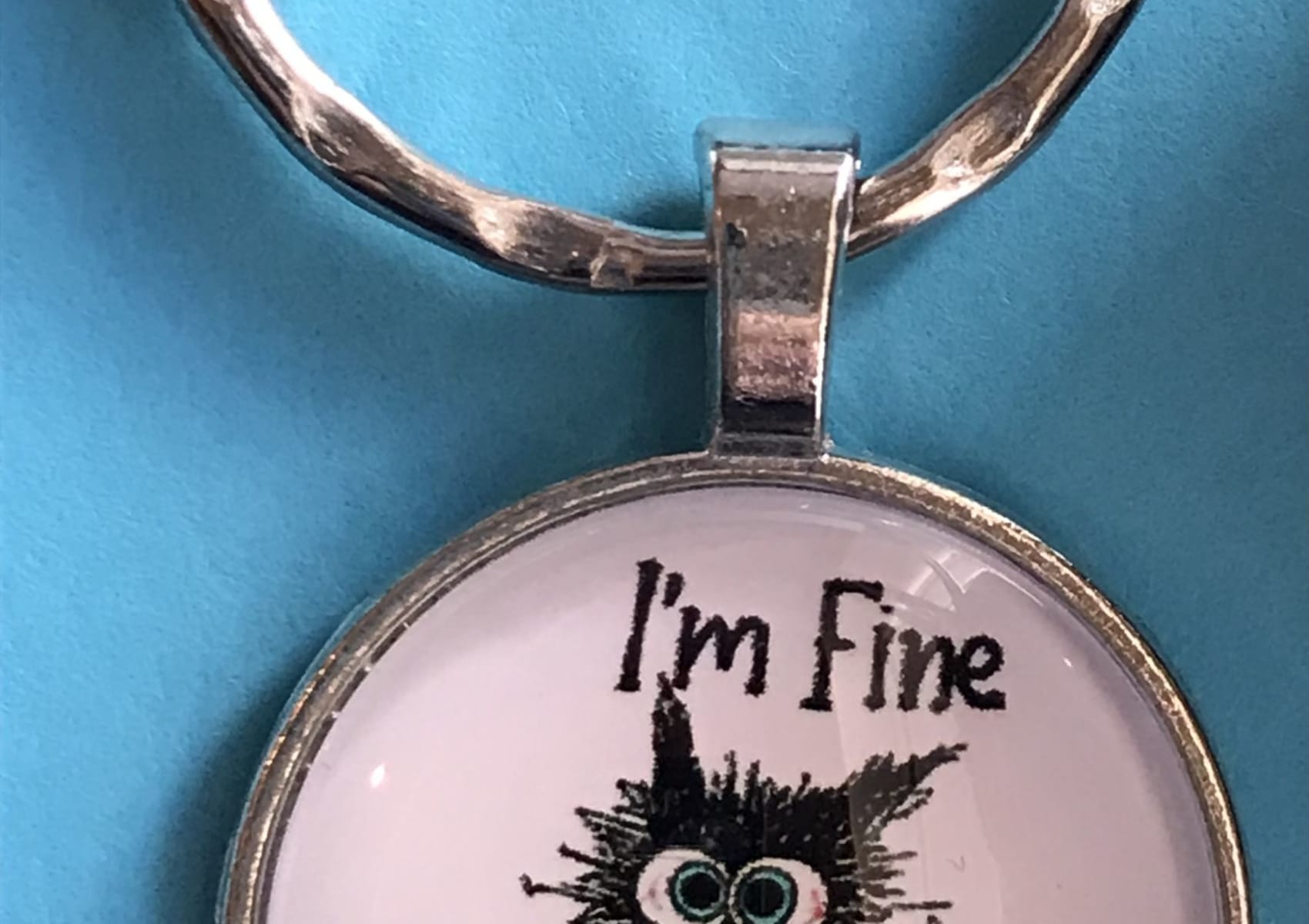 Round keyring - I'm fine everything is fine spooked cat